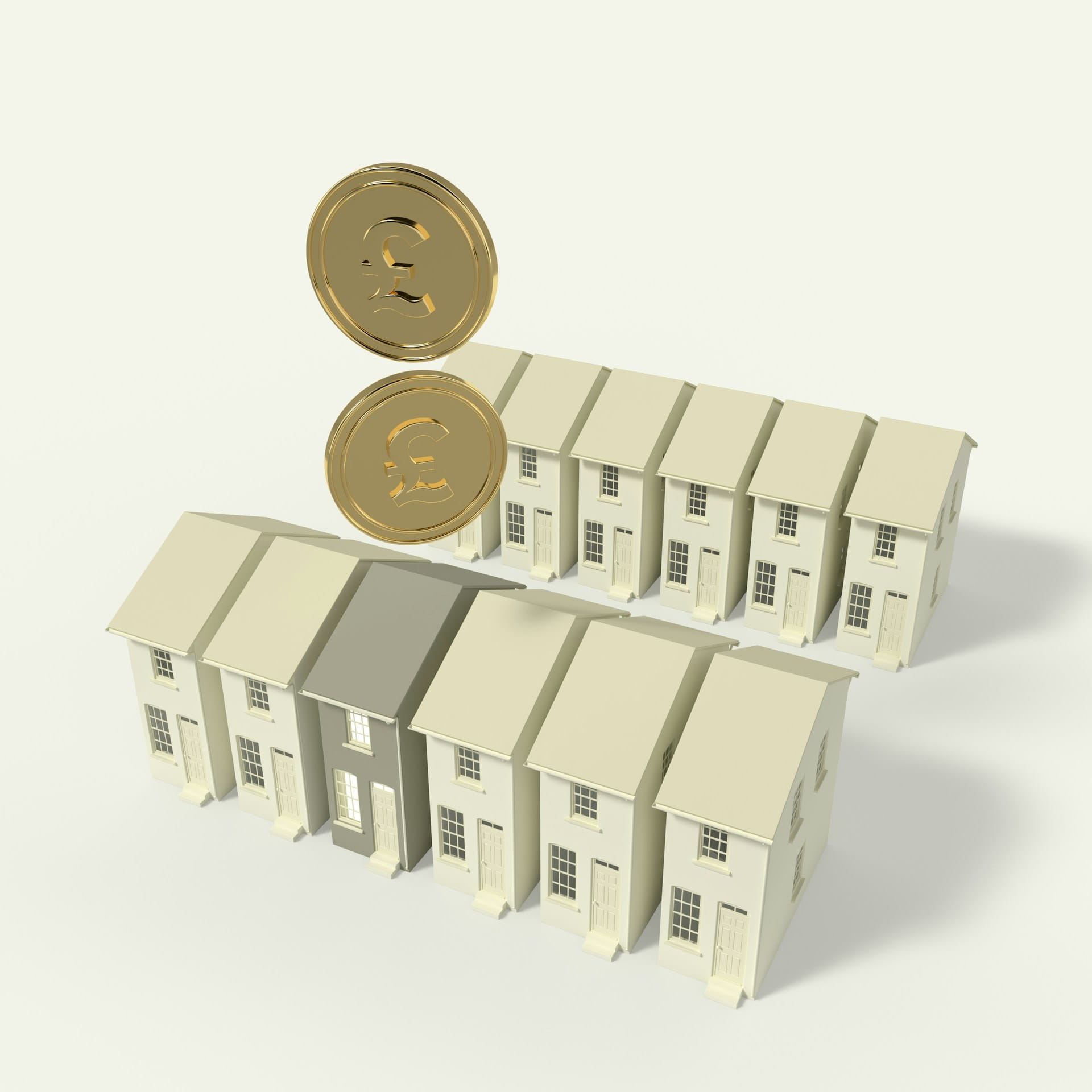 Coins being placed into a figurine of a row of houses.