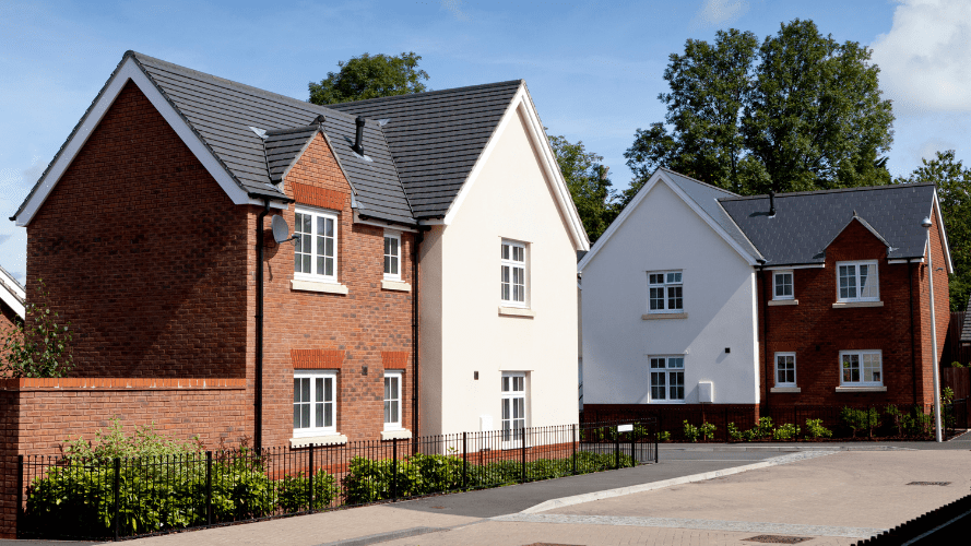 A photograph of a series of mewly built houses.