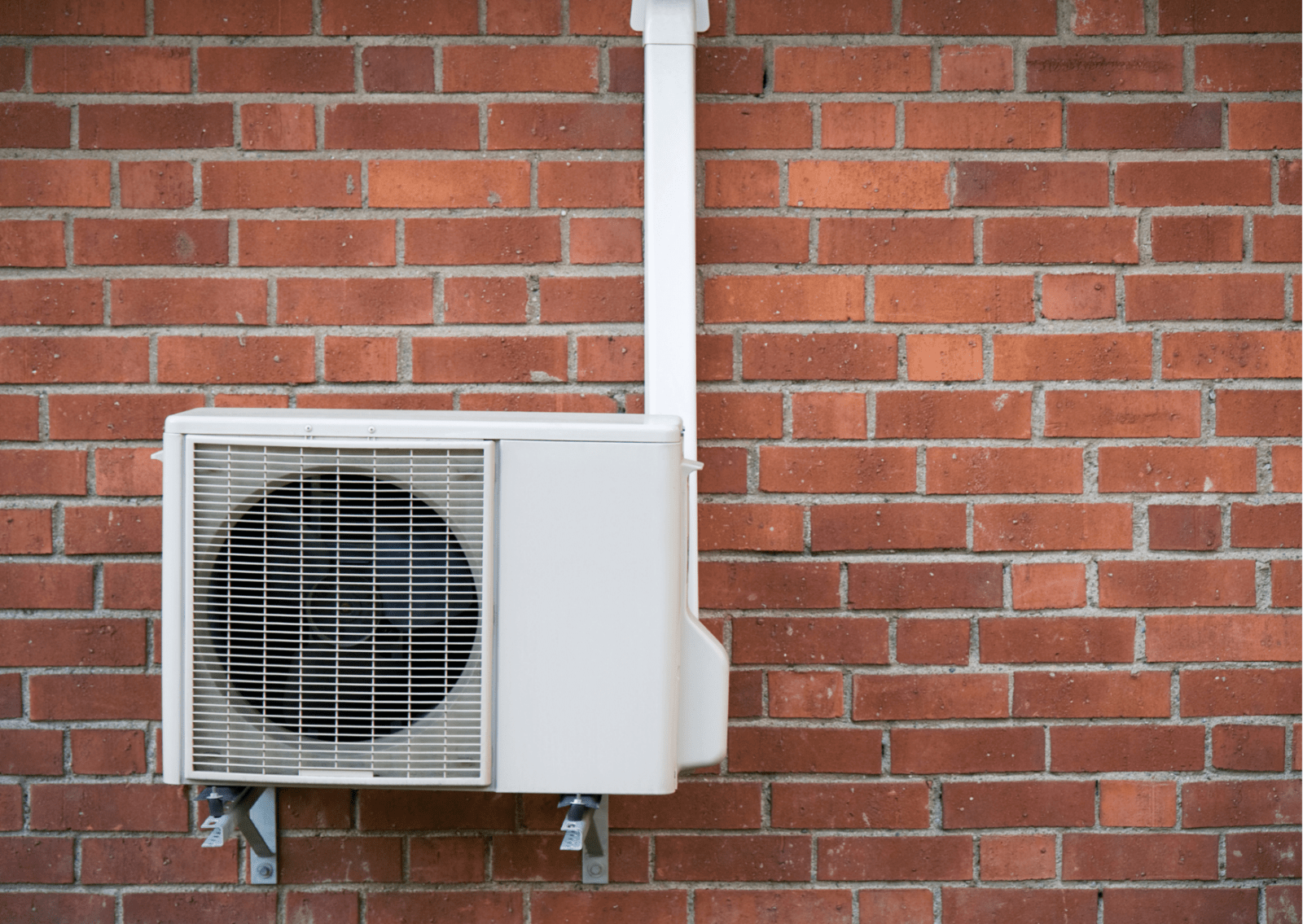 A photograph of an external heat pump.