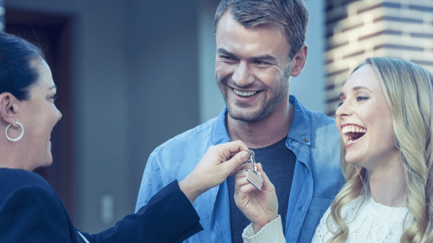 Potential tenants viewing a property with a letting agent