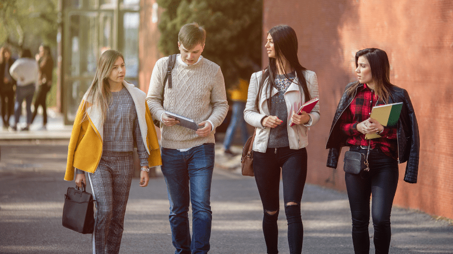 Four university students walking home