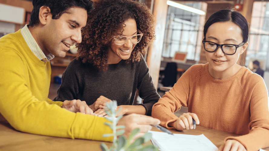 A landlord and tenants running through their tenancy agreement together